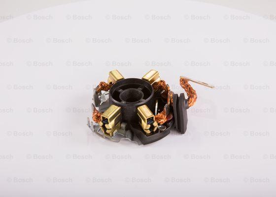 BOSCH 1 004 336 411 - Kronšteins, Ogļu sukas www.autospares.lv