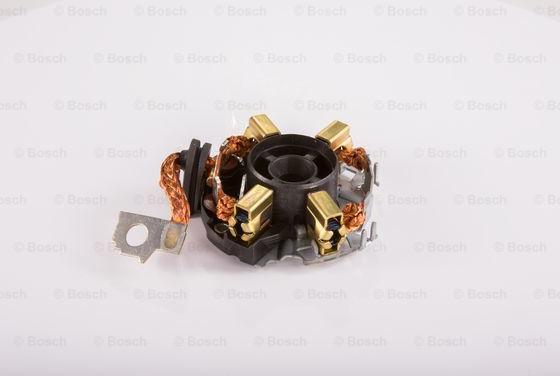 BOSCH 1 004 336 411 - Kronšteins, Ogļu sukas www.autospares.lv